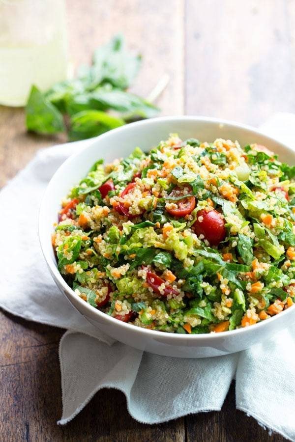 Herbed Quinoa Garden Veggie Salad in a white bowl.