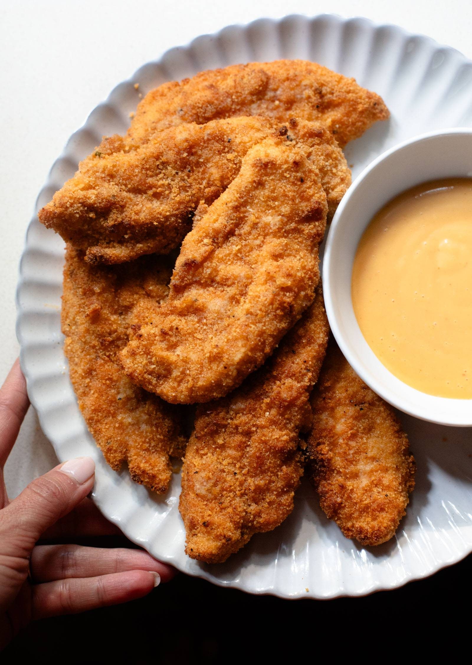 Chicken tenders with gochujang sauce.