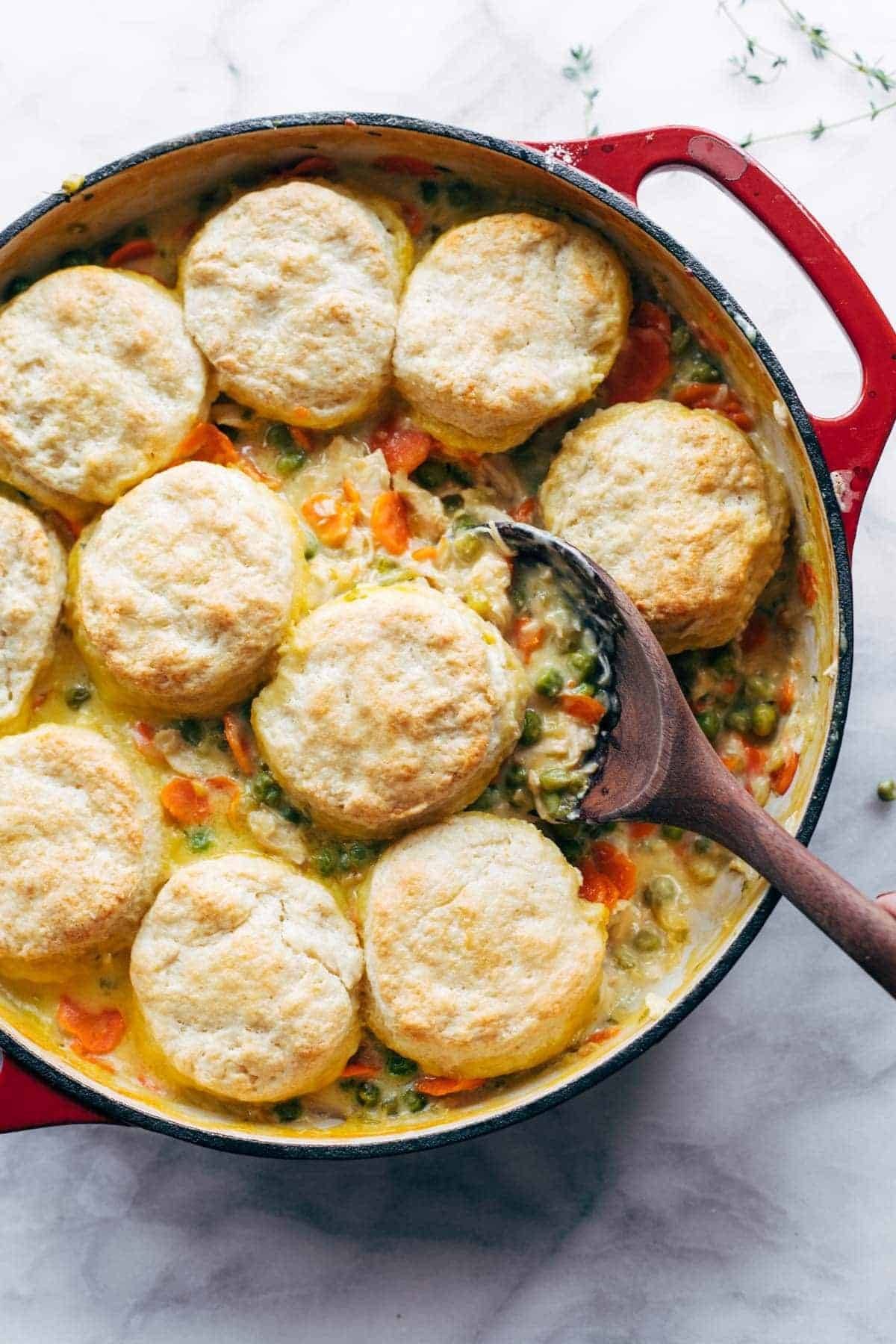 Chicken pot pie with biscuits on top.