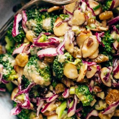 Clean Broccoli salad in a bowl with a fork.